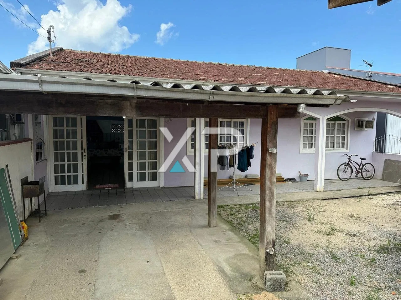 Terreno com 2 casas à venda no bairro Pachecos