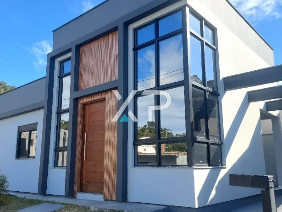 Casa com 03 dormitórios sendo 01 suíte á venda no Bela Vista